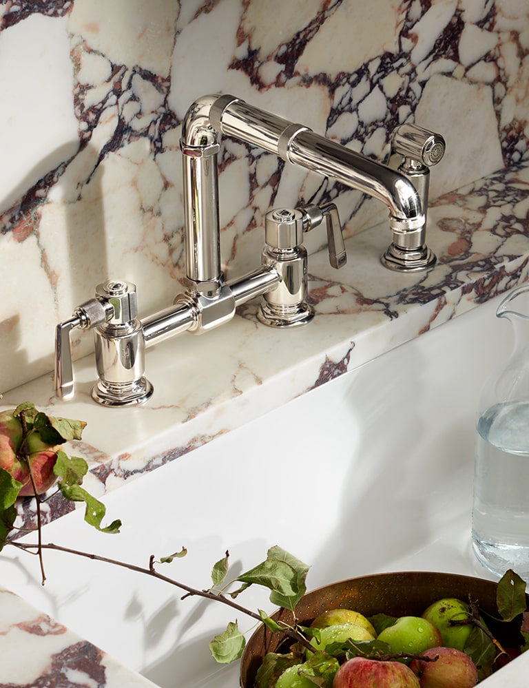 These exclusive bridge faucets have a sophisticated feel--perfect for traditional, rustic and industrial spaces.
